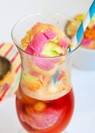 Unicorn Floats - This Unicorn Float recipe is the perfect kids dessert. I love how colorful it is and that' it's an easy dessert! The unicorn poop trend is fun for kids of all ages! | thebewitchinkitchen.com