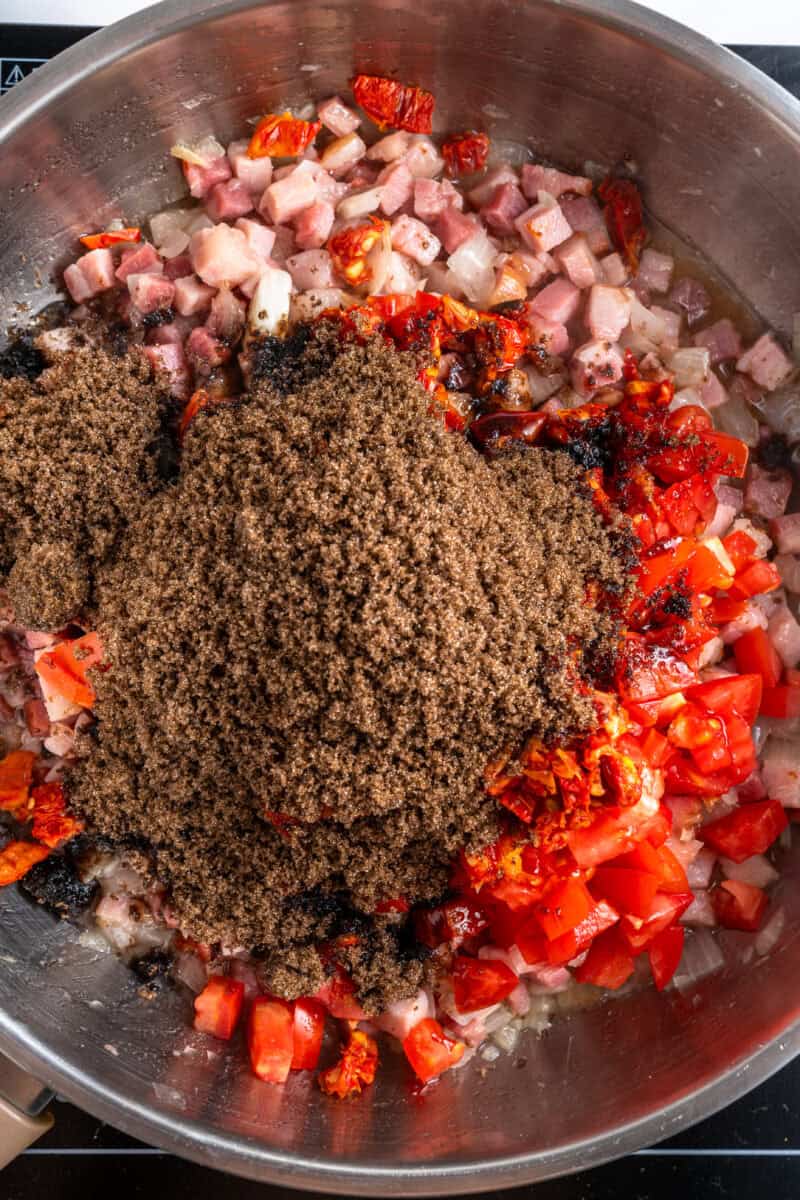 bacon tomato jam ingredients in a bowl