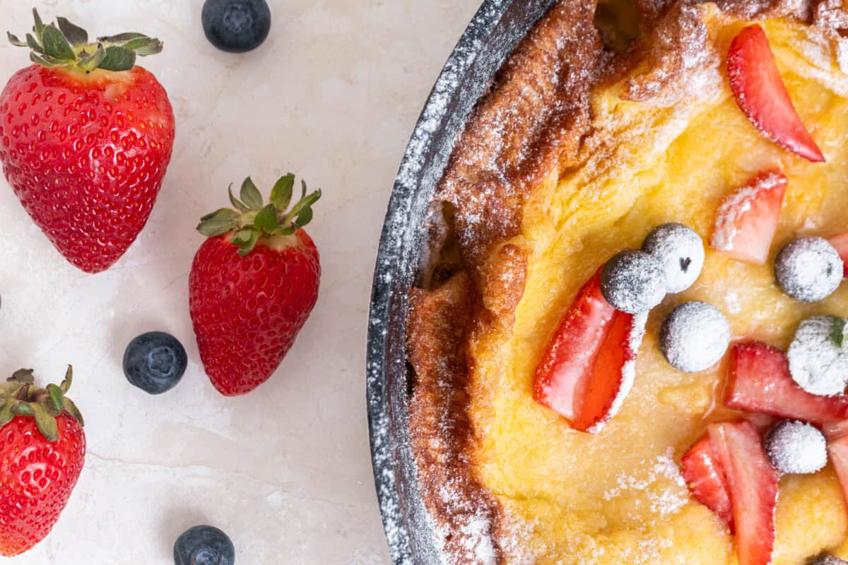 dutch baby pancake with strawberries and blueberries