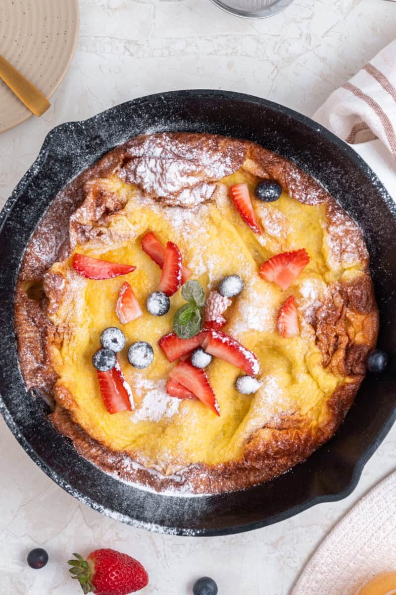 Dutch baby pancake in a cast iron skillet