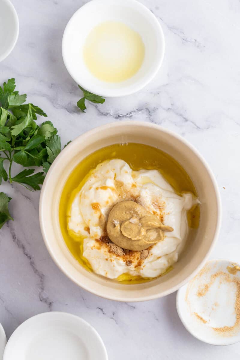 ingredients for greek yogurt salad dressing in a bowl