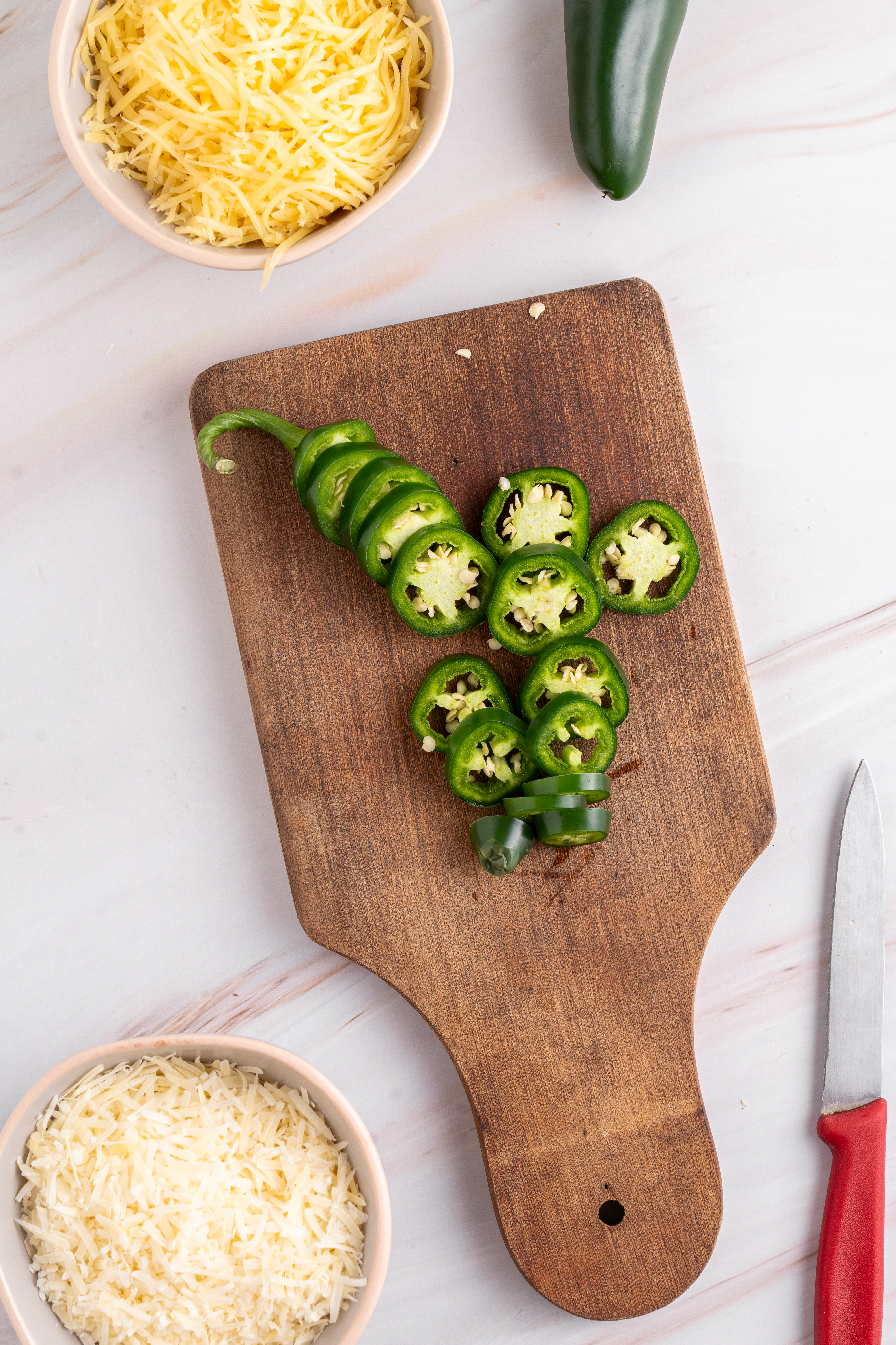 diced jalapenos on a cutting board