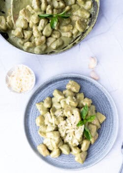 Overheard of potato gnocchi served on a blue plate