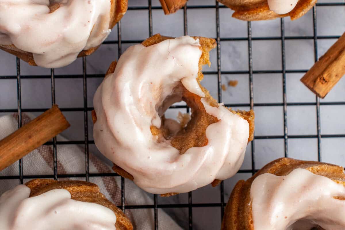 Overhead of mini bundt cakes with a bite taken out of one