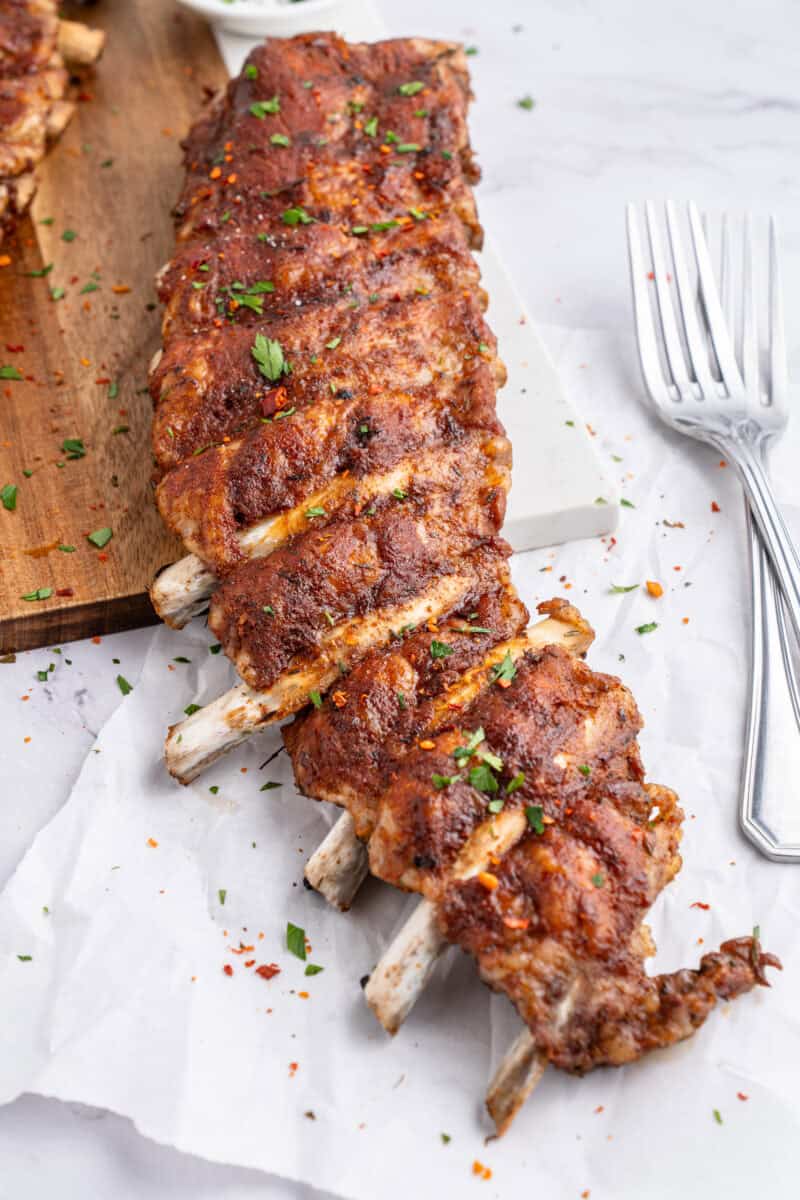 Overhead of Instant pot pork ribs with a fork nect to it